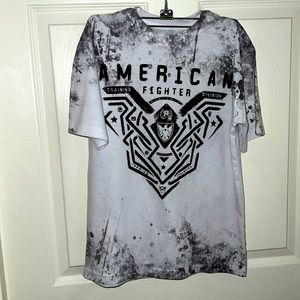 Boy’s American Fighter size medium black/white tee shirt.
